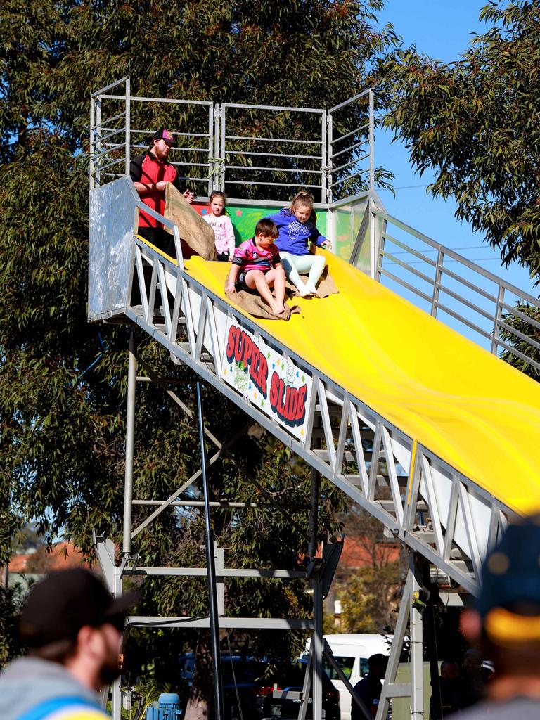 Lots of attractions to keep the young ones entertained at the Rouse Hill Rhinos Pink Day in Kellyville. (AAP IMAGE / Angelo Velardo)