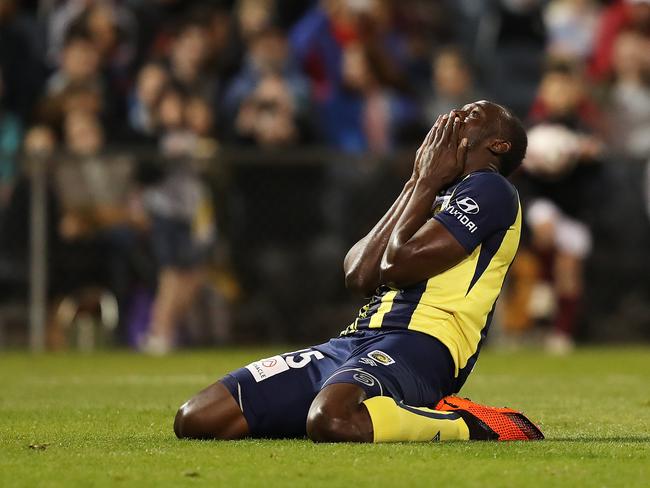 Mariners Usain Bolt reacts after missing a shot at goal during the Central Coast Mariners v Macarthur South West United pre-season match at Campbelltown Stadium, Sydney. Picture: Brett Costello
