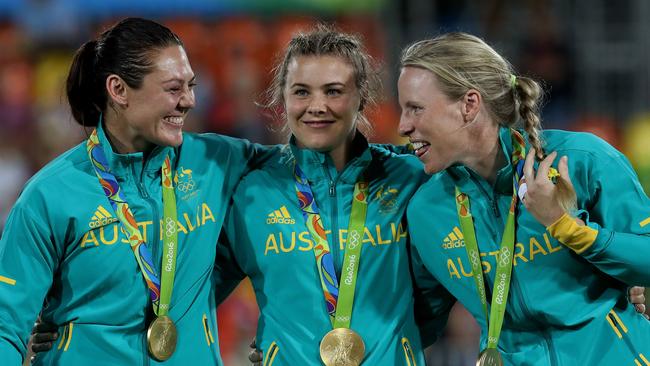 Sharni Williams, Nicole Beck and Gemma Etheridge celebrating their 2016 Rio Olympic gold.