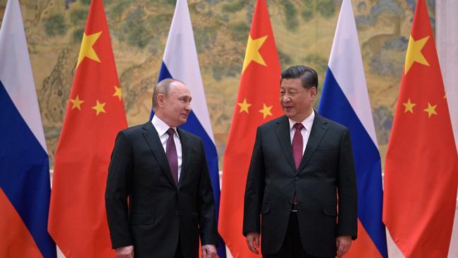 Vladimir Putin (L) and Chinese Presiand Xi Jinping metin Beijing earlier this month. Picture: AFP.