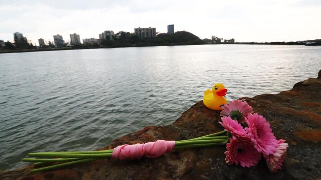 A tribute is seen at a vigil for a murdered nine-month-old girl in Tweed Heads. (AAP Image/Jason O'Brien)