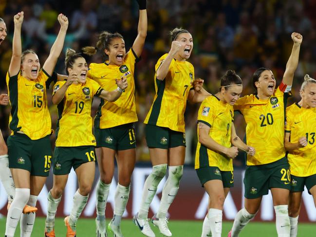 Matildas players celebrate winning the FIFA Womens World Cup Quarter final match against France in a penalty shootout at Brisbane Stadium. Picture Lachie Millard