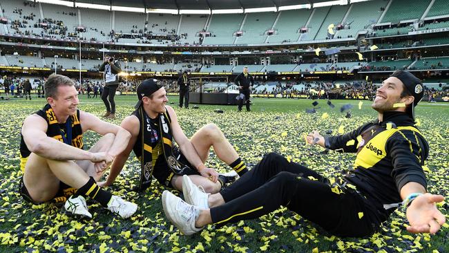 Dylan Grimes, David Astbury and Alex Rance celebrate winning the 2019 AFL Grand Final. Picture: Quinn Rooney/Getty Images.