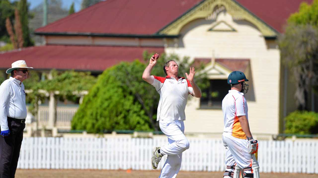 John Cleary on the way to taking four wickets for Warwick Hotel Colts in the preliminary final at Slade Park. Picture: Gerard Walsh