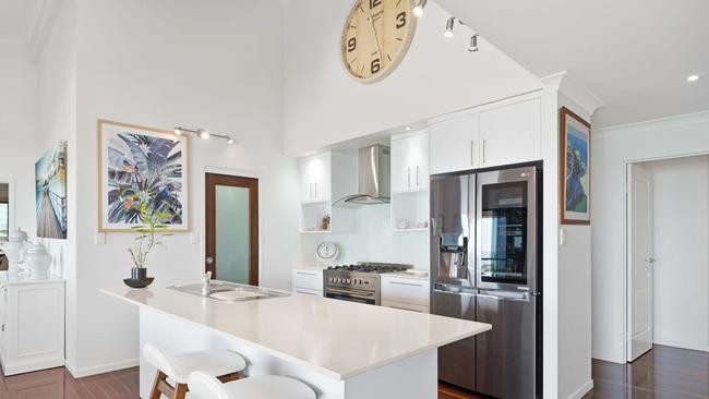 The ‘chef’s kitchen’ boasts a walk-in pantry, gas cooker and stone Italia benchtops. Picture: Contributed