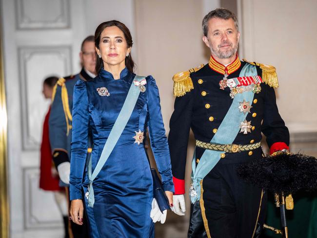 Crown Prince Frederik of Denmark and Crown Princess Mary of Denmark arrive to greet the diplomatic corps during a New Year reception. Picture: AFP