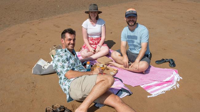 Steve Pinnell, Emily Bostock and Michael Bostock at the Darwin Beer Can Regatta at Mindil Beach, 2023. Picture: Pema Tamang Pakhrin