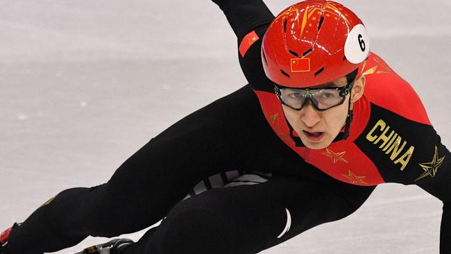 China's Wu Dajing has broken his own world record to win the men’s 500m short track gold. Picture: AFP