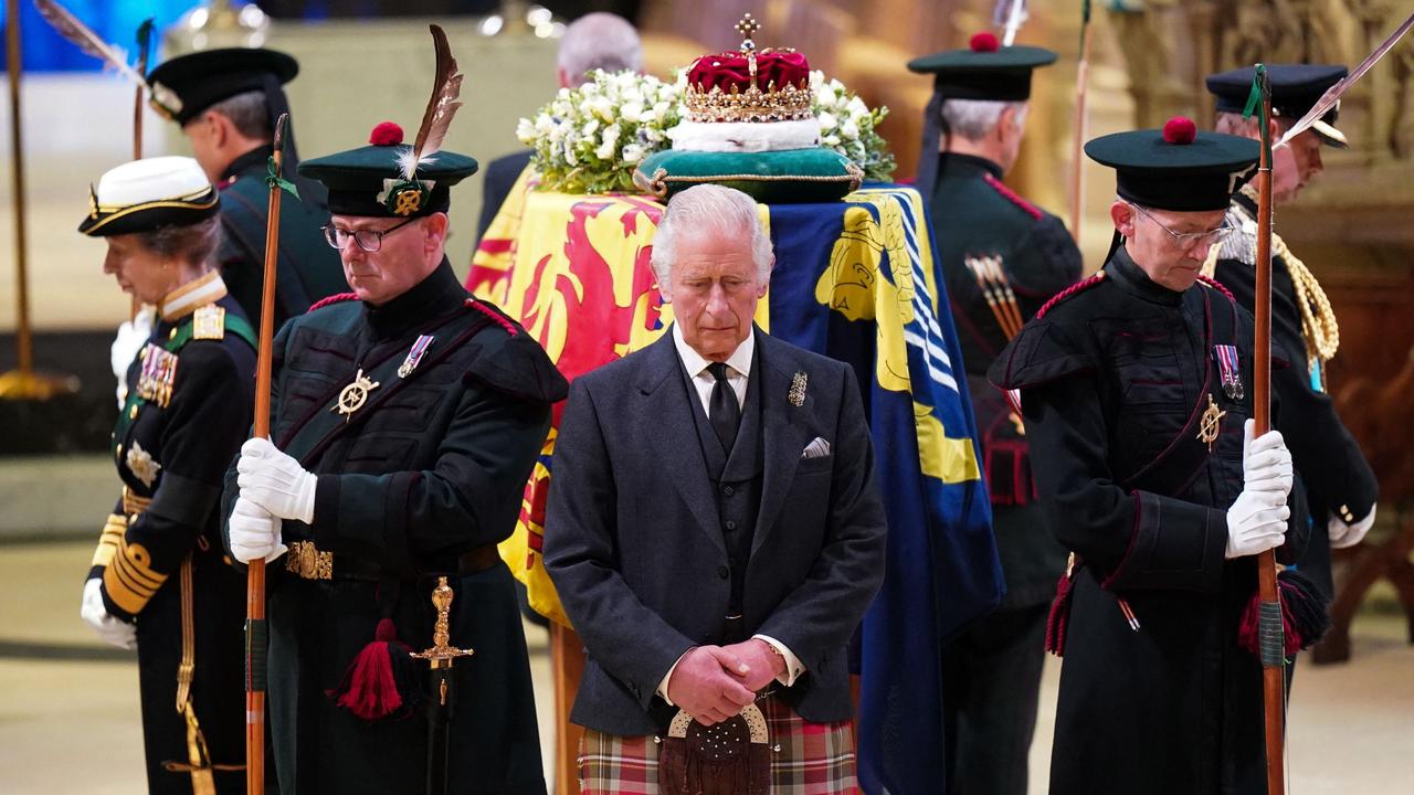 A sad duty: The Queen’s children hold vigil over her coffin. Picture: Jane Barlow / POOL / AFP