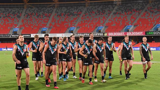 Power players are self-isolating after their win over the Gold Coast on Saturday night. Picture: AAP Image/Darren England