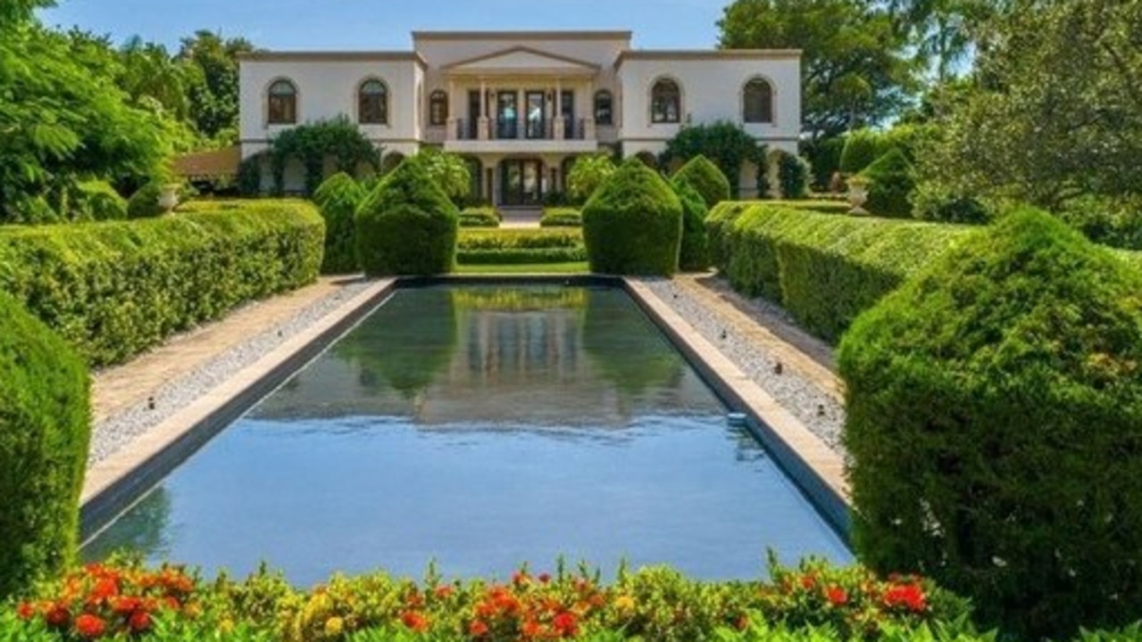 The couple retained some of the original features, including a large water feature at the front of the home. Picture: Realtor