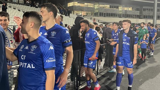 South Melbourne celebrating with fans after its 2-1 win over Melbourne Knights.