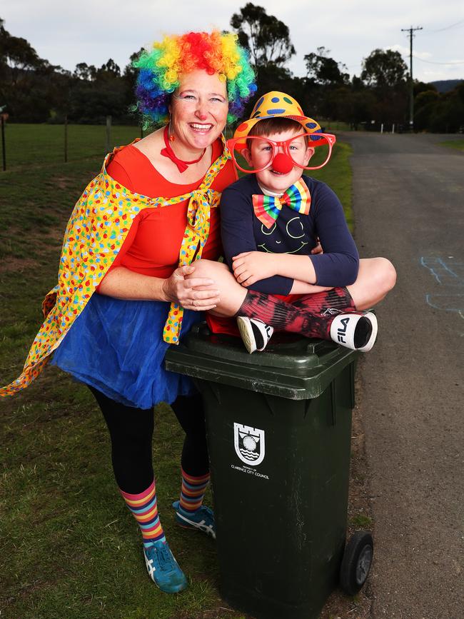 Ange Watson and son Arthur Synott, 7, of Acton Park. They have been participating in the Facebook movement Bin Isolation Outing where people dress up to take their bins out for a bit of fun. Picture: NIKKI DAVIS-JONES