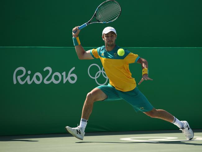 RIO DE JANEIRO, BRAZIL - AUGUST 06: Jordan Thompson of Australia in action against Kyle Edmund of Great Britain in the men's first round on Day 1 of the Rio 2016 Olympic Games at the Olympic Tennis Centre on August 6, 2016 in Rio de Janeiro, Brazil. (Photo by Julian Finney/Getty Images)