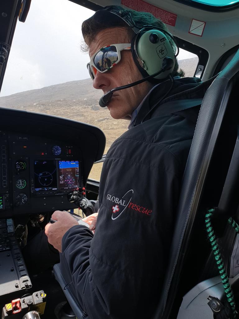 Helicopter pilot Maurizio Folini preparing for an airborne rescue. Folini holds the record for the highest altitude rescue.