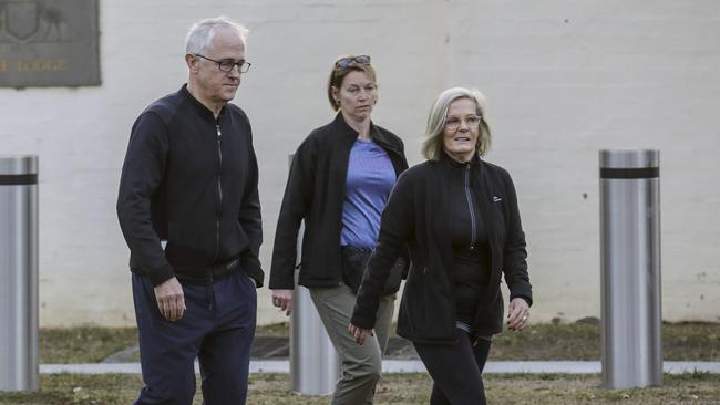 Malcolm Turnbull leaves The Lodge in Canberra with wife Lucy on his morning walk. Picture by Sean Davey.