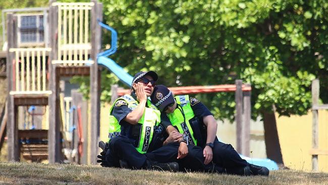 Devastated police officers at the scene of a jumping castle accident, where five children have died at Hillcrest Primary School in Devonport. Picture: Monte Bovill/ABC News