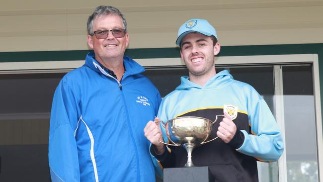 Western Districts cricket captain Luke Neale accepts the trophy after his side won the 2024 TCI two-day competition. Picture: Allyson Gardener.