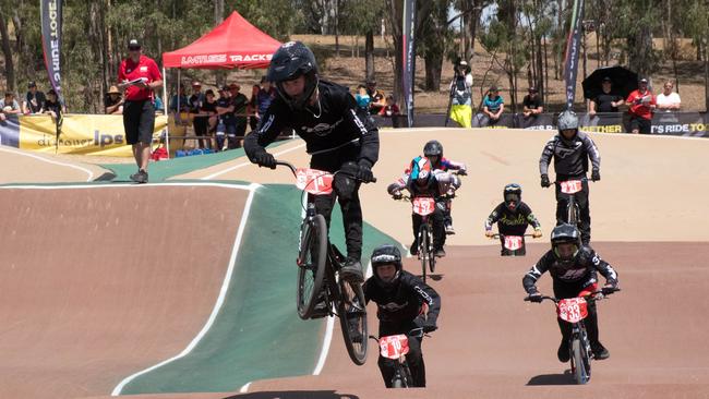 A high-flying competitor leads the way at the Ipswich-hosted Queensland BMX championships. Picture: Gary Reid