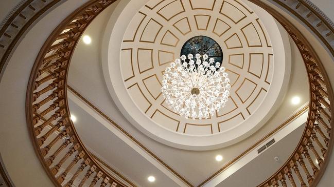 Looking up through multiple storeys towards the home’s main dome.