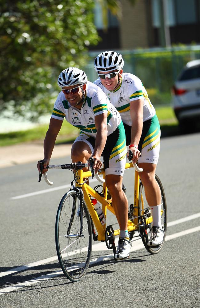 Para Olympian Bryce Lindores (back) with his bike partner Mark Jamieson (front) riding on Albatross Ave, Mermaid Beach.