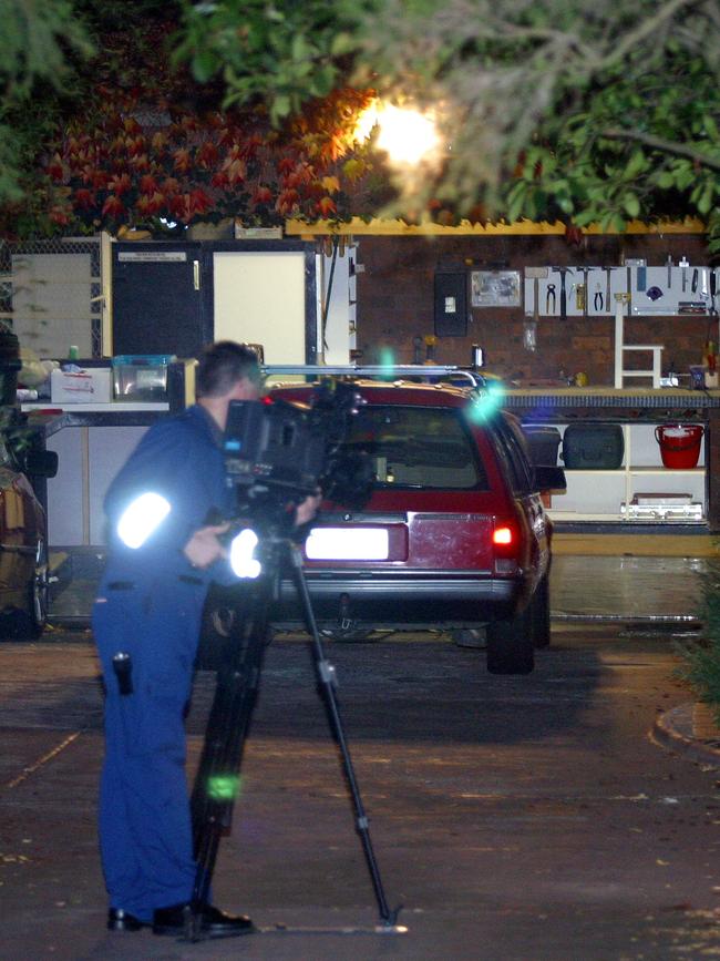 Police examining the home where the Hodsons were killed. Picture: Darren Mcnamara 