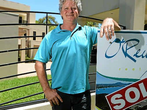 GOING UP: Real estate agent Ross O’Reilly outside a Statue Bay property which recently sold for more than $2 million. Picture: Chris Ison Rokcproperty