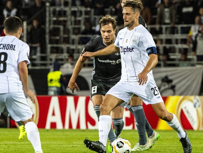 James Holland plays a pass in a recent Europa League clash.