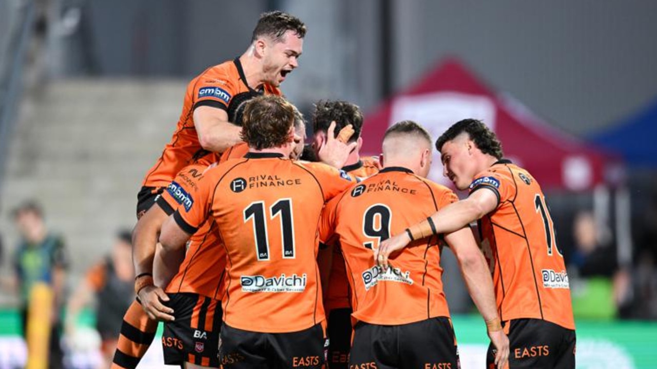 Brisbane Tigers forward Tristan Powell scores a try. Photo - QRL