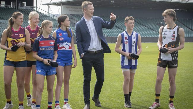 TFC AFL Club Inaugural Board of Directors, (Club Ambassador) Jack Riewoldt and junior footballers Harriet Bingley, Ella Nast, Shakaya Blackwell, Sophie Dean, Cooper Field and Sam Husband at UTAS Stadium. Picture: Chris Kidd