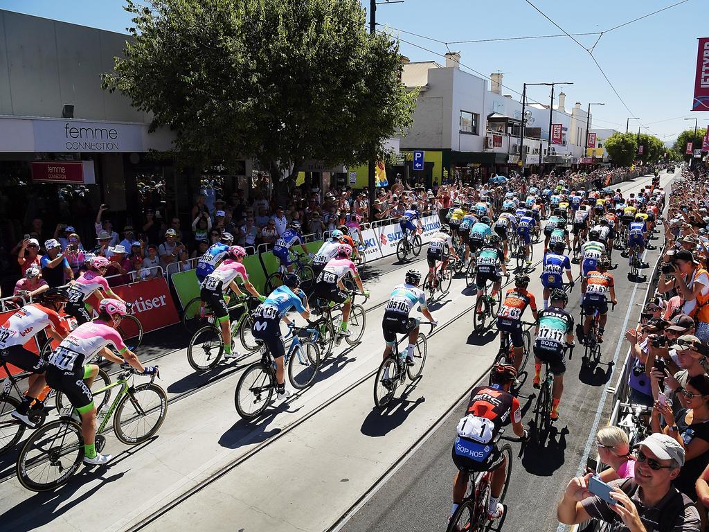 Riders compete in the neutral zone down Jetty Road, Glenelg at the start of stage three of the 2018 Tour Down Under. Picture: Daniel Kalisz/Getty Images