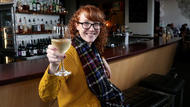 CHEERS: Amy Sincock enjoys a wine in the Oxford Hotel in North Adelaide. Picture: Calum Robertson