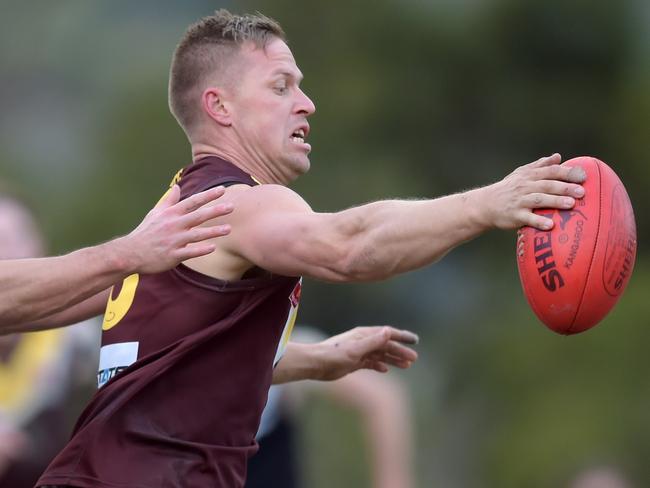 EFL (division 3) football: Boronia versus Donvale at Tormore Reserve, Boronia. Donvale's Chris Sutherland (39) and Boronia's Matt Buzinskas (16).