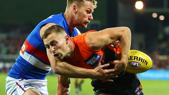 Devon Smith in action against the Bulldogs in GWS’s first ever Friday night game. Picture: Getty