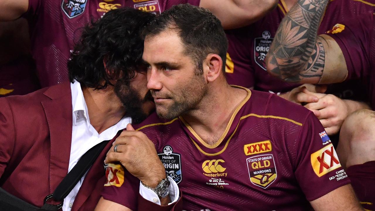 Cameron Smith (right) is being urged to come out of Origin retirement.