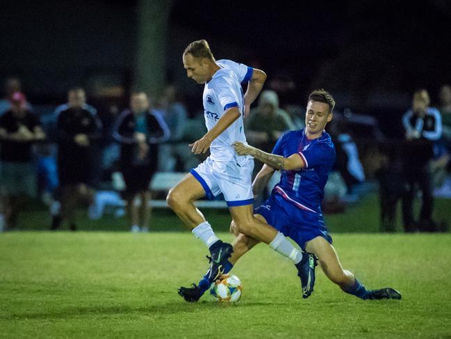 Surfers Paradise Apollo Gold Coast Premier League player Teddy Watson (white strip) in action against Robins in the semi-final at Lex Bell Oval on Saturday, November 7. Picture credit: East End Digital.