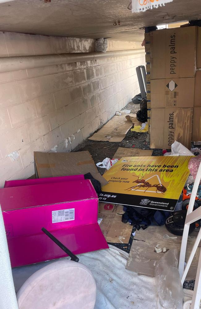 A squatter has taken over the back of the salon with her belongings.