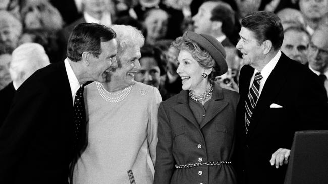 US President Ronald Reagan and his wife, Nancy, right, with Vice President George Bush and Barbara Bush in 1985.