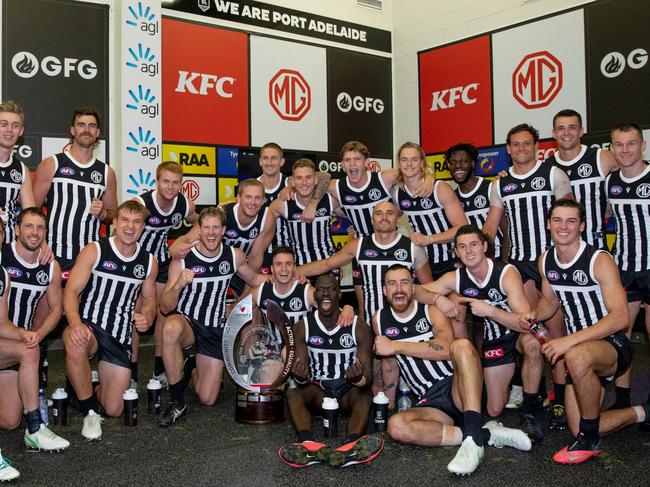 MUST CREDIT - Port Adelaide celebrate their Showdown victory in the change rooms whilst wearing their prison bar guernseys. Picture Mark Piovesan Photography