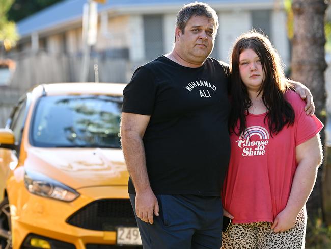 Todd Power and his daughter Kayla after their road rage horror. Picture: Lyndon Mechielsen/Courier Mail