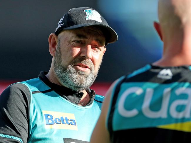 Darren Lehmann, head coach of the Brisbane Heat talks with Chris Lynn before the Big Bash League (BBL) cricket match between the Perth Scorchers and the Brisbane Heat at Optus Stadium in Perth, Saturday, January 11, 2020. (AAP Image/Richard Wainwright) NO ARCHIVING, EDITORIAL USE ONLY, IMAGES TO BE USED FOR NEWS REPORTING PURPOSES ONLY, NO COMMERCIAL USE WHATSOEVER, NO USE IN BOOKS WITHOUT PRIOR WRITTEN CONSENT FROM AAP