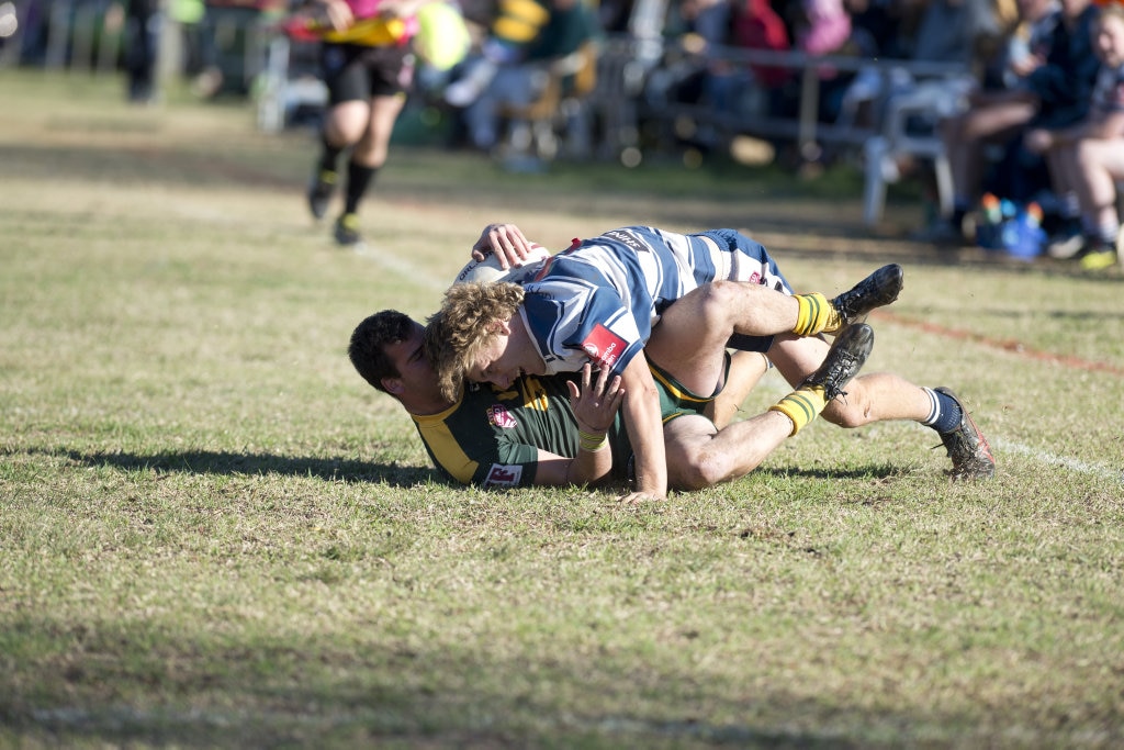 Jaren Bender, Brothers tackles Braydon Wilson, Wattles. TRL, Wattles vs Brothers. Sunday, 8th Jul, 2018. Picture: Nev Madsen