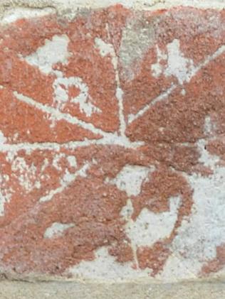 An anti-witch symbol called a ‘merel’ crudely scratched into brickwork at Shene, Tasmania. Picture: Ian Evans.