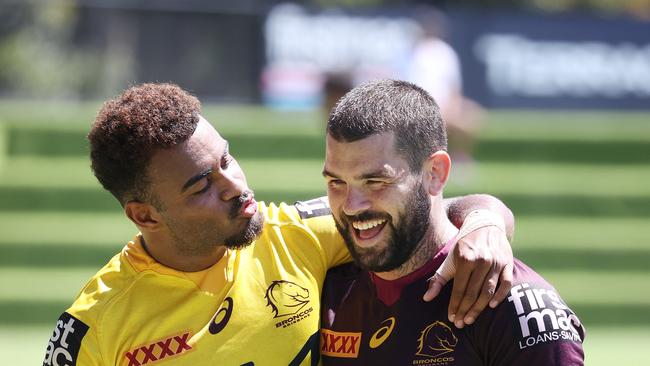 Ezra Mam showing some love for Adam Reynolds, Brisbane Broncos training, Red Hill. Picture: Liam Kidston