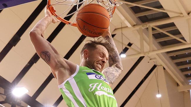 MELBOURNE, AUSTRALIA - JANUARY 18: Nathan Sobey of the Phoenix dunks during the round 17 NBL match between South East Melbourne Phoenix and New Zealand Breakers at State Basketball Centre, on January 18, 2025, in Melbourne, Australia. (Photo by Kelly Defina/Getty Images)