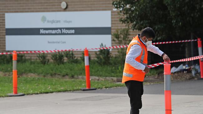 Security roped off the Newmarch House entrance as the COVID-19 outbreak grew. Picture: Richard Dobson