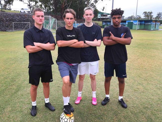 The reigning Metro Division 3 soccer premiers have accused their own club, Southport Soccer Club, of not letting them play this year because they don't drink enough at the bar. Among the team are (from left) Brooklyn Gossling 18, Mark Merideth, 19, Zac Robson, 18 and Gerard Faya, 19. Picture: Glenn Hampson