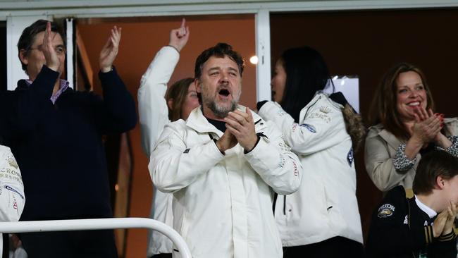 Russell Crowe celebrates a try by South Sydney's Lote Tuqiri during the Manly v South Sydney rugby league Second Qualifying Final at Allianz Stadium, Sydney. Pic Brett Costello