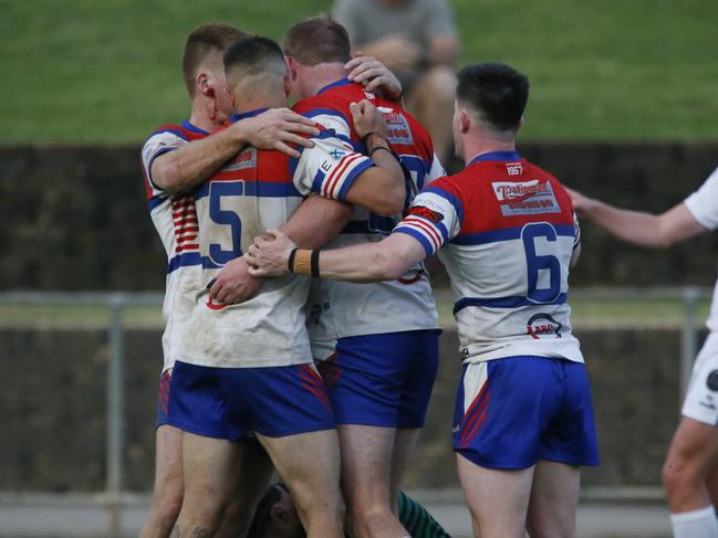 Emu Plains centre Greg Alderson is congratulated by Daniel Warren (No.5) and Isaac Thompson (No.6). Picture Warren Gannon Photography