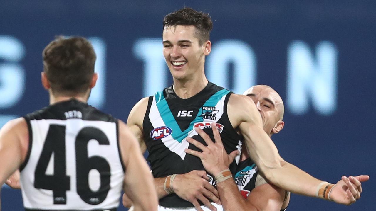 Connor Rozee celebrates one of his five goals against Brisbane. Picture: Chris Hyde/Getty Images